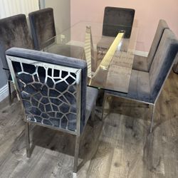 Elegant Chrome & Glass Dining Set – 6 Chairs Included