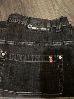 Black southpole red tab