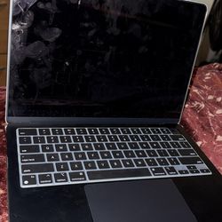 MacBook Air, Color dark blue, Size Large. Charger included