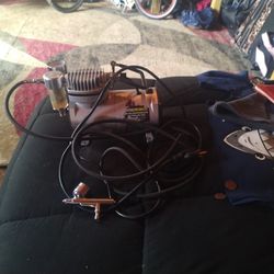 central pnuematic mini air compressor with airbrush and hose