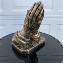 Praying Hands statue