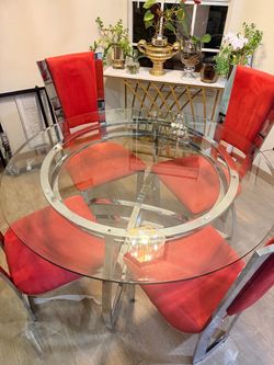 glass table with four chairs