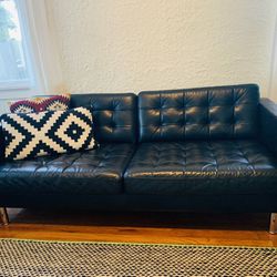Mid century modern black leather sofa with metal legs 