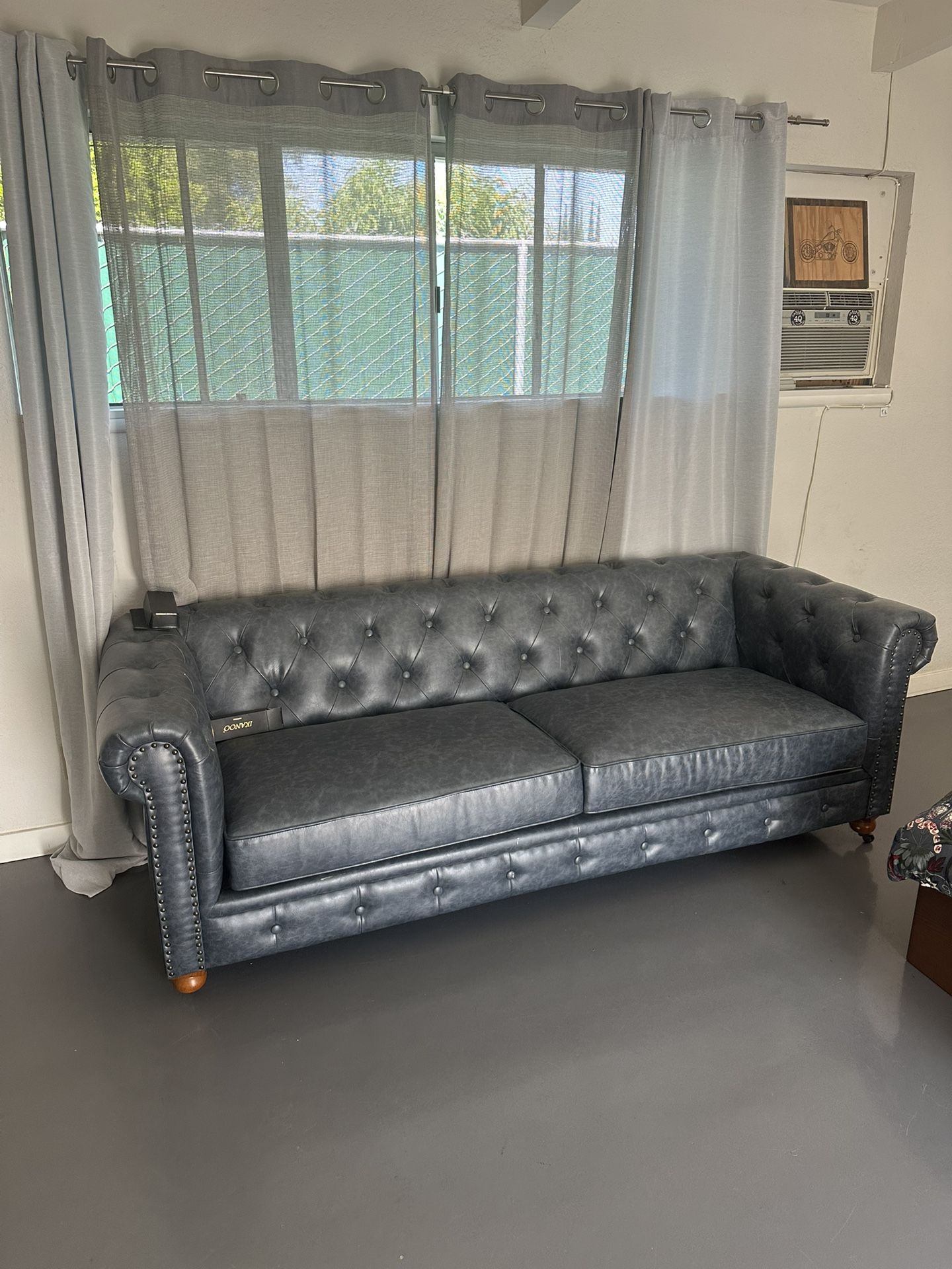 Chesterfield style sofa $175 8x3 ft