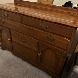Wooden dresser with mirror