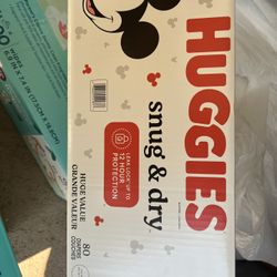 Diapers- Huggies snug and Dry  Size 7
