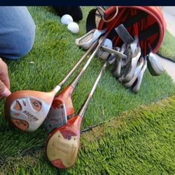 Golf Bag, Golf Clubs , And Gold Balls