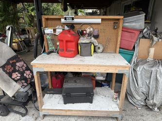 Wooden Work Bench With Peg Board Wall