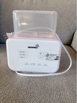 Growns baby bottle warmer. Never used.