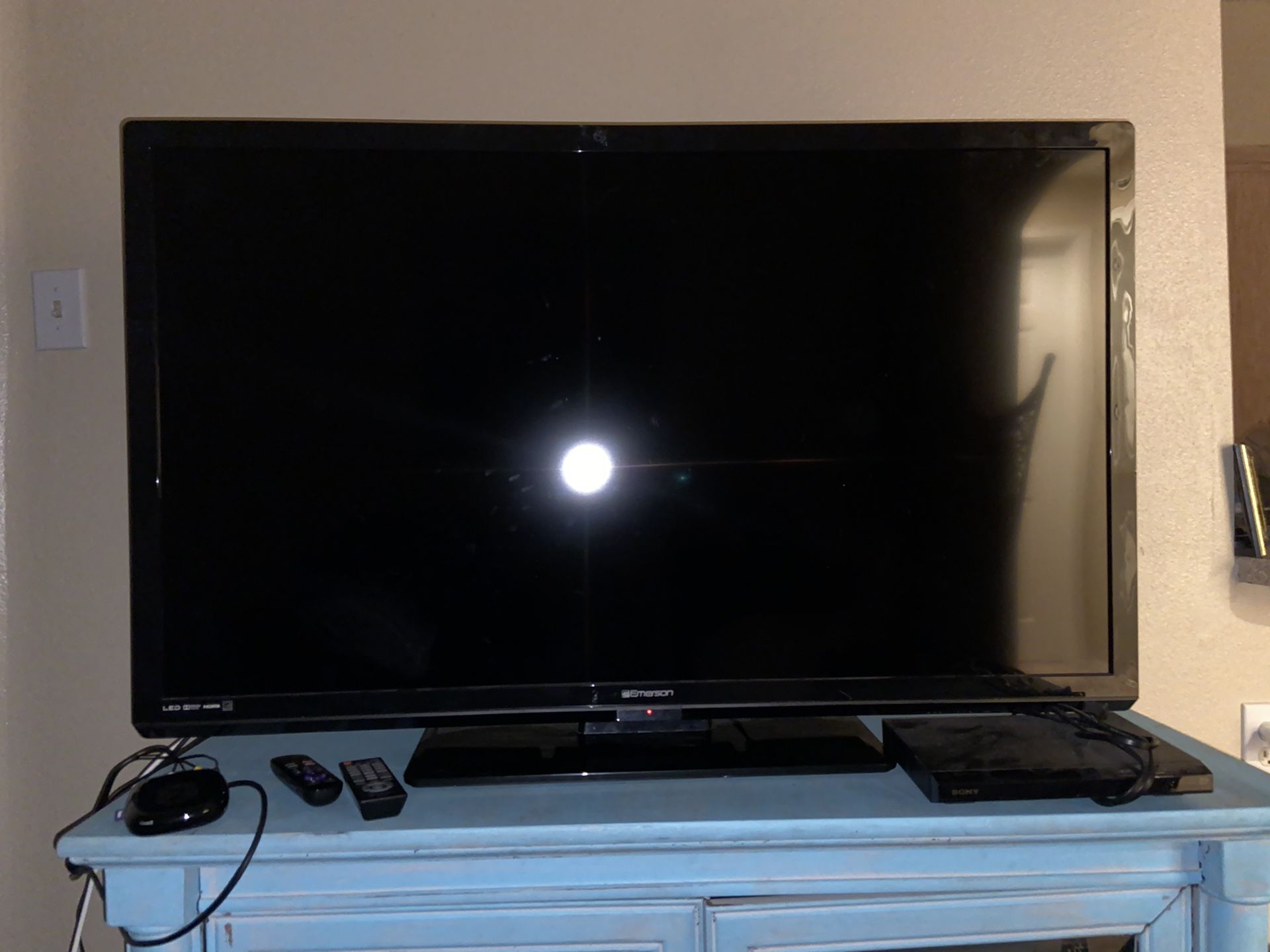 50’ Flatscreen TV with Roku & TV stand