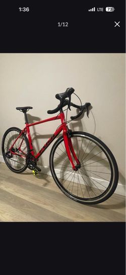 Red Road Bike with Drop Handlebars