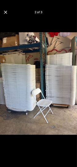 White folding chairs s,a,l, e