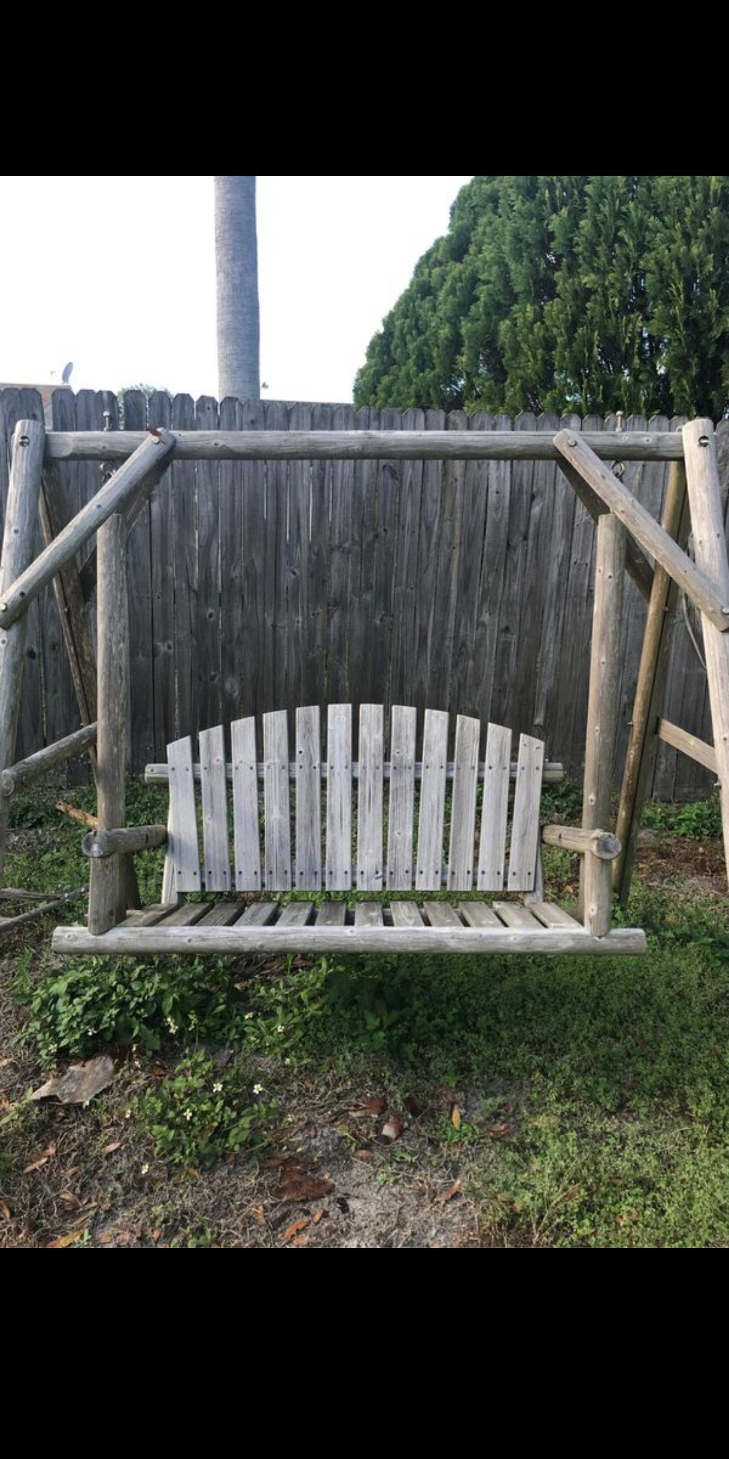 Neat real wood porch or yard swing!