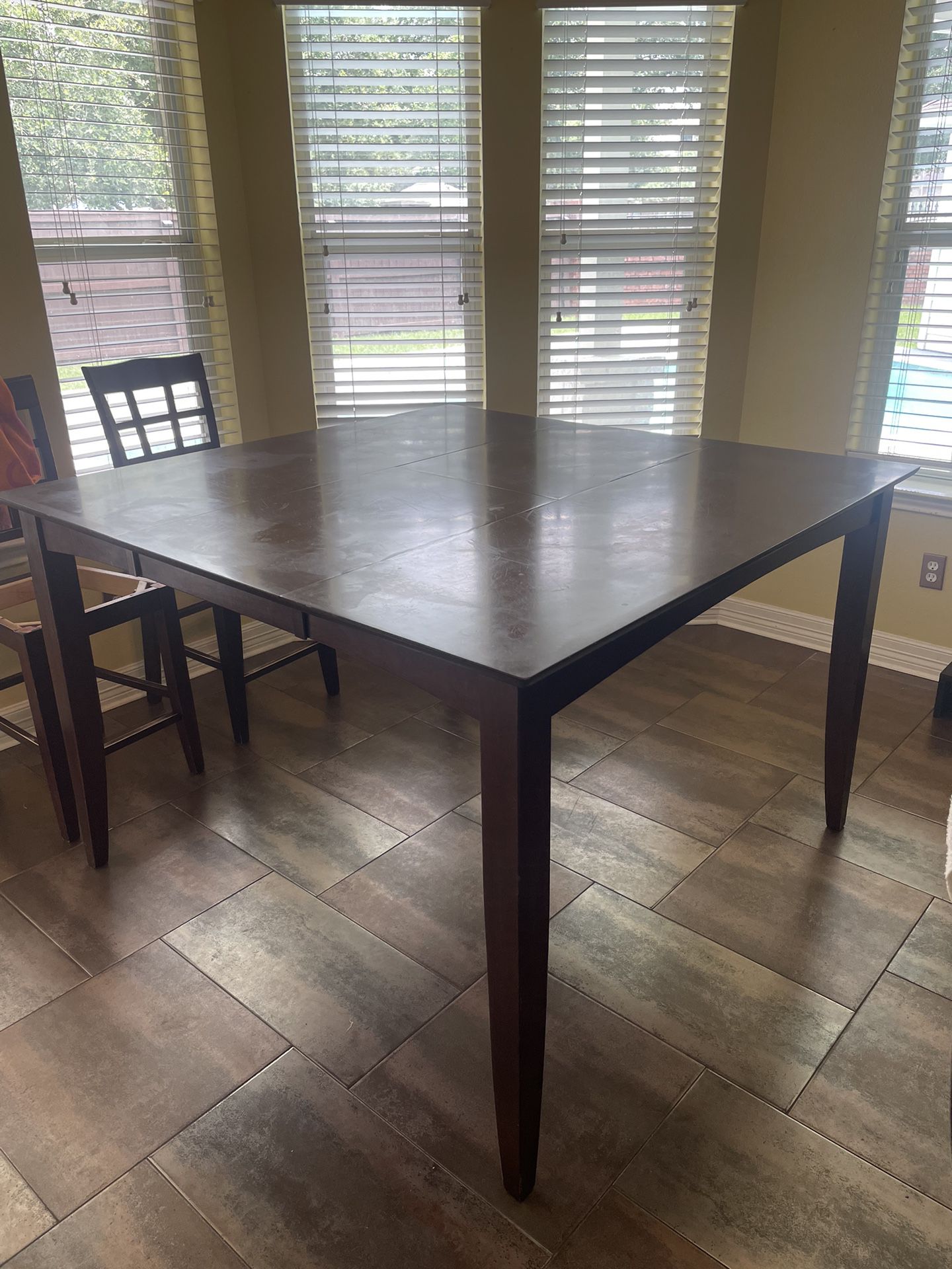 Counter Height Dining Table (with Leaf to make smaller) and four chairs. 