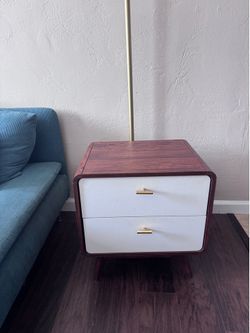 Side table with white drawer and dark oak veneer.