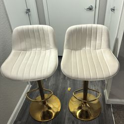 White And Gold Suede Bar Stools— $50 Ea.