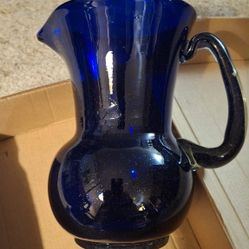 vintage cobalt blue hand-blown glass pitcher. 