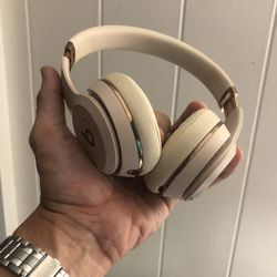 Gold Wireless Beats Headphones