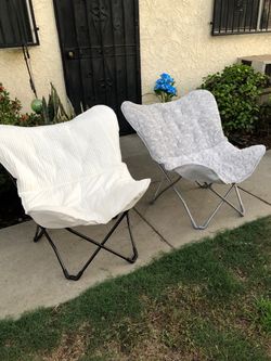 2 Brand New Butterfly Folding Chairs with Storage Bags $30 each.