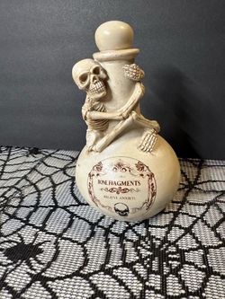 Skeleton on bottle decor.