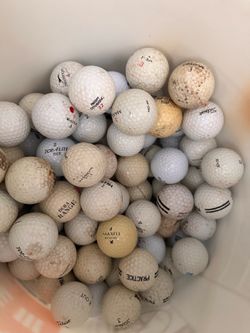 5 buckets of golf balls
