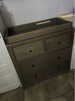 Baby crib and dresser