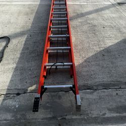 LADDER.   Werner 24 ft. Fiberglass Extension Ladder (23 ft. Reach Height) with 300 lb. Load Capacity Type IA Duty Rating