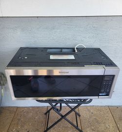Stainless Steel Microwave the only thing is that the pushing button to open it is broken but it still works to open it