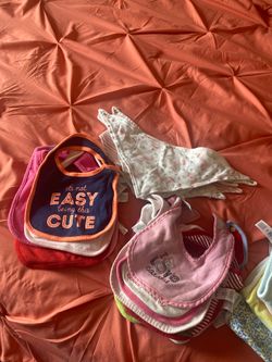 Babygirl bibs and burp cloths