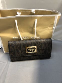 Michael Kors full size leather wallet.
