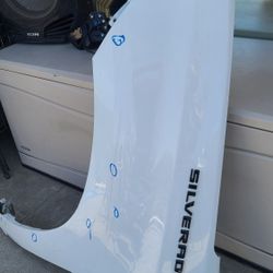 2019 - 2024 CHEVROLET SILVERADO 1500 LEFT FENDER DRIVER SIDE GENUINE USED OEM.  X4