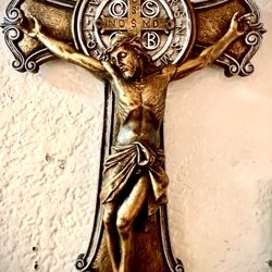 Beautiful Crucifix with Jesus sculpture with dimensions H10xL6.5xD1.5 inch Lbs 0.8. This is a quality solid composite resin sculpture in excellent lik