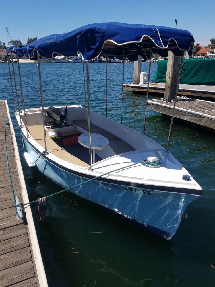 Duffy boat not electric has an outboard motor