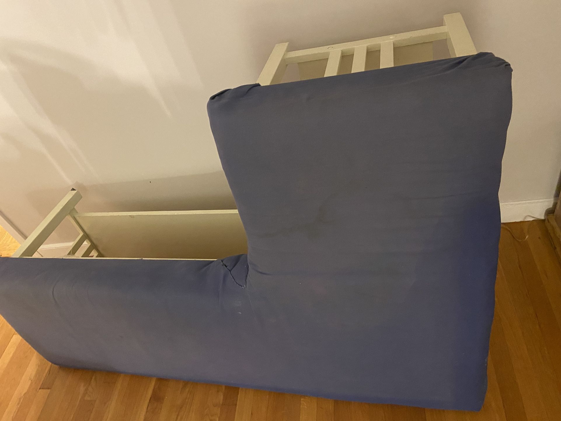 2 white unfinished furniture benches made into kitchen corner seating