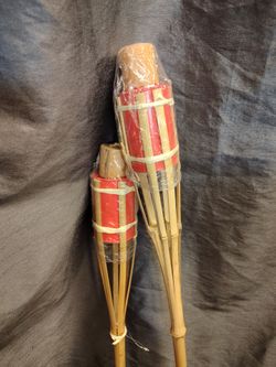 Two brand new tiki torches