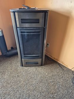 Freestanding pacific energy lp gas fireplace