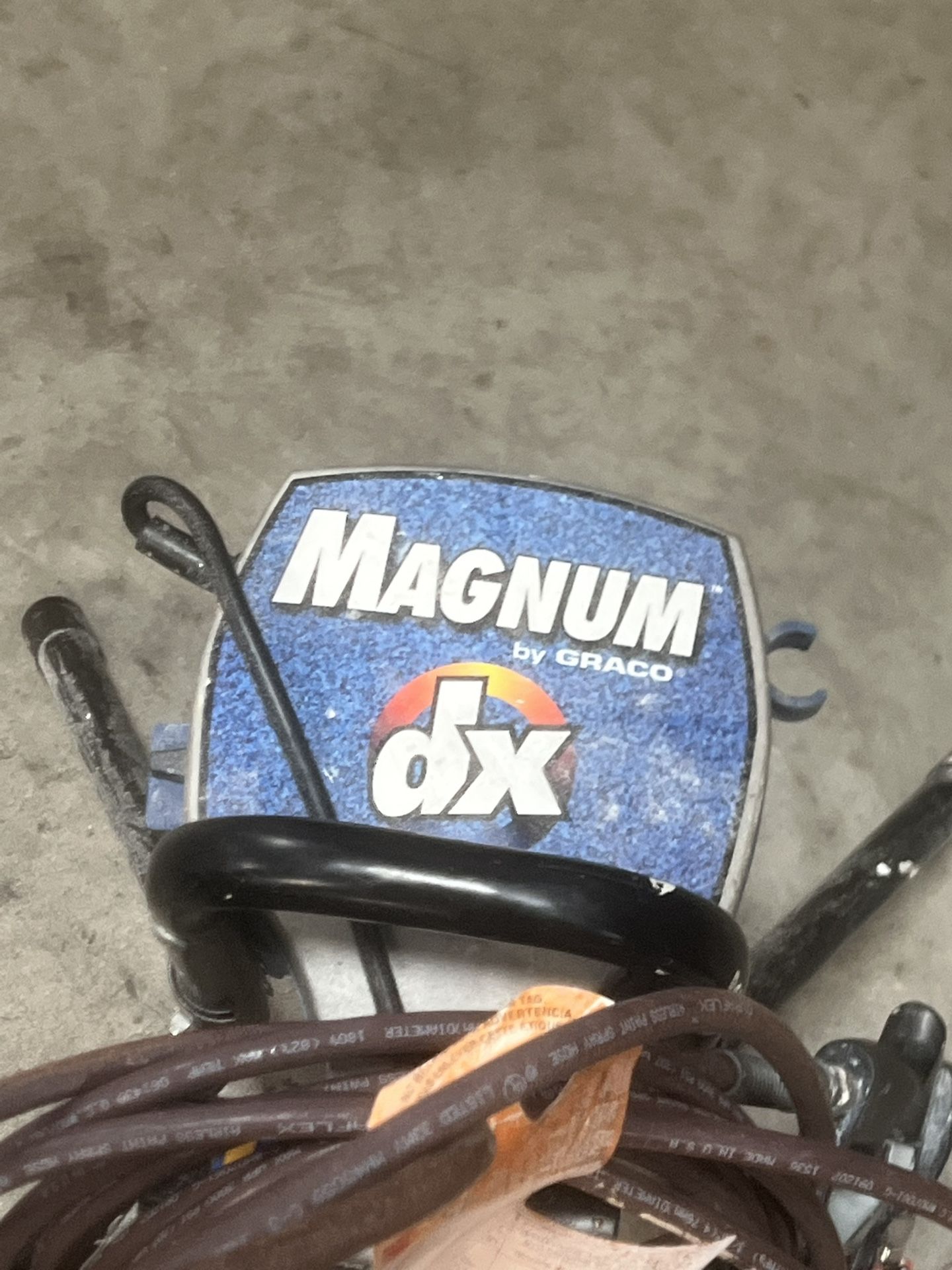 Magnum By Graco DX Airless Paint Sprayer for parts or repairs only. Bought it to paint the house and ended up hire someone. It fires up and sold witho