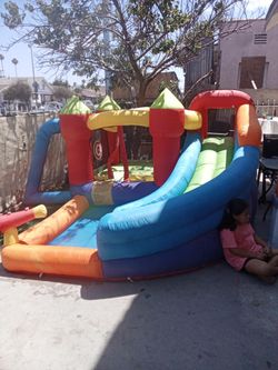 Bounce house with pool and water slide 12x12 with pool.