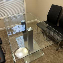 Seiber Glass Table ONLY. Chairs Are not for sale.