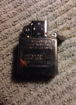 Zippo Brand New full size insert dates may vary
