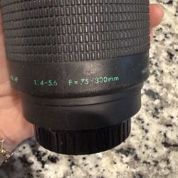 Misc.  55 mm Camera 75-300 mm Lens, filters, and Tulip lens hood.