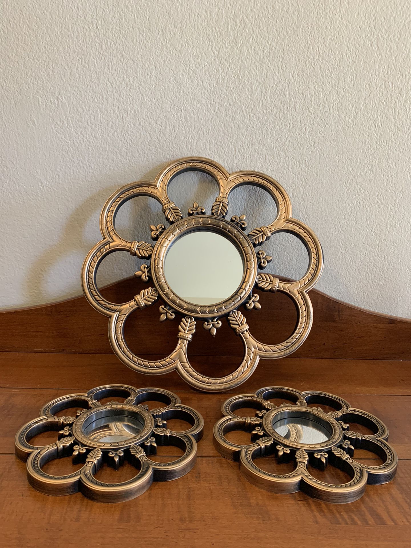 Set of 3 flower mirrors - plastic material smaller are just under 8” diameter, larger one is 14”