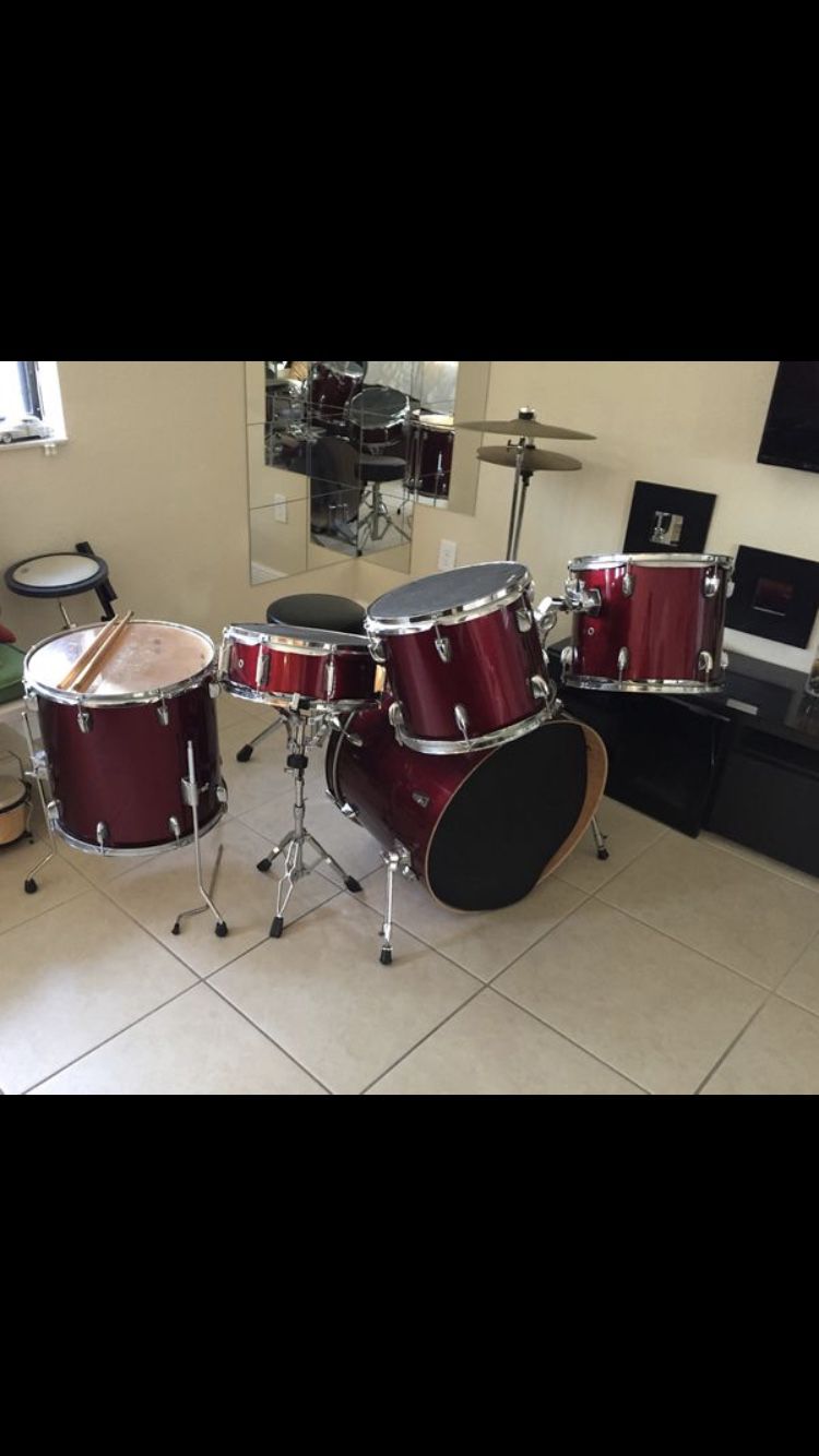 Red Drum Set with Extra Percussion Accessories