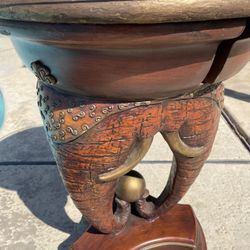 Wood elephant side table with small drawer / glass top protector- 23.5 inches high/. 18 inches wide 