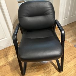 Black leather pillow soft guest chair by The HON Company