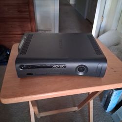Xbox 360 Slim.  No Power Cord.