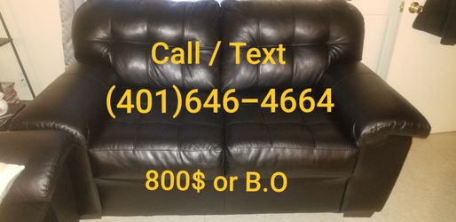 BLACK LEATHER SOFA AND LOVE SEAT