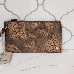 J. Peterman Hand painted embossed leather wristlet