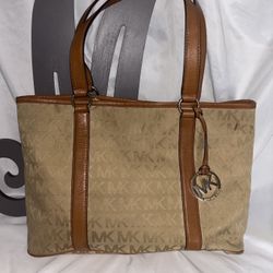 Michael Kors Light Brown Signature Canvas/ Leather Tote Bag.