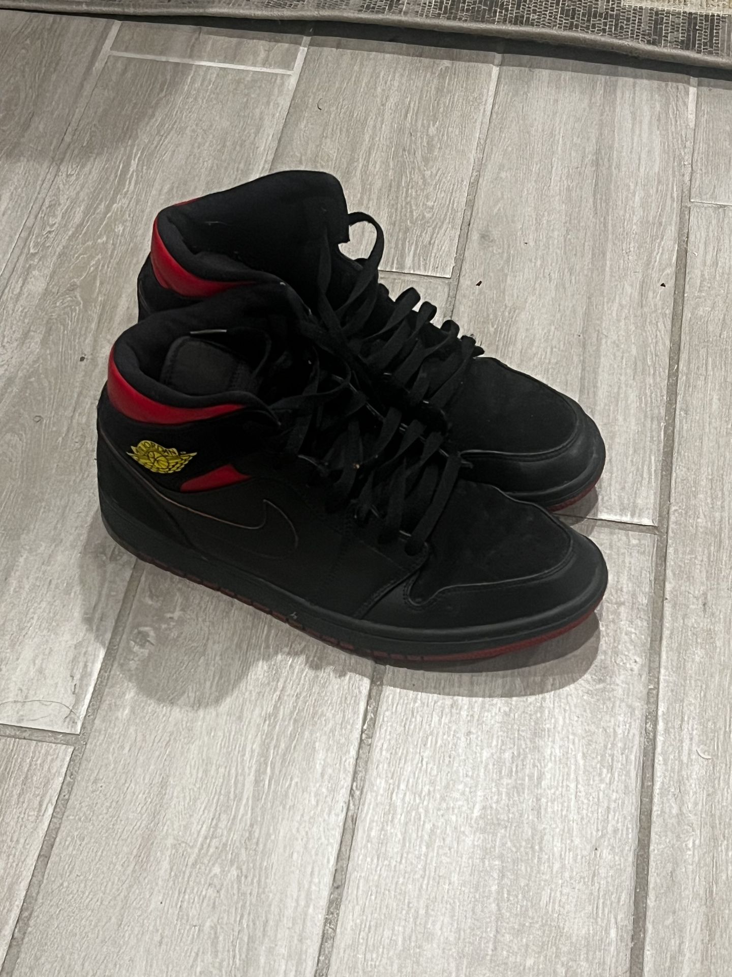 Red and black Jordan 1’s